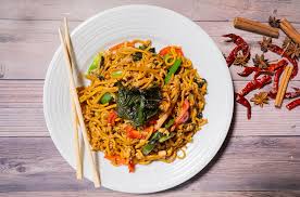 Asia Nine signature dishes Drunken Noodles, Pad Thai, Rock Shrimp Tempura, Assorted Specialty Rolls